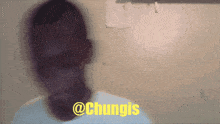 a blurry picture of a man with the words @chungis written in yellow