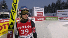 a skier wearing a bib with the number 39
