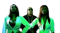 a man and two women are standing next to each other in green clothes
