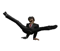 a man in a suit is doing a handstand on the ground