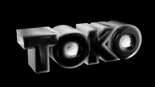 the word toko is written in black and white