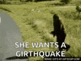 a crow is flying over a grassy field with the words `` she wants a garthquake '' .