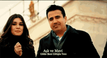 a man and a woman standing next to each other with a caption that says aşk ve mavi gotur beni gittigin yere