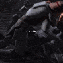 a blurry picture of a person with the words l + ratio written on the bottom