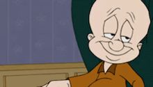 a cartoon character is sitting in a chair and making a face