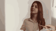 a painting of a woman with red hair is made in animotica