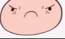 a close up of a cartoon face with an angry look on it .