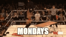 a man in a wrestling ring with the words monday 's on it