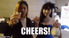 two women are toasting with champagne and the word cheers is on the bottom of the image .