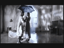 агутин под дождем дождь зонт зонтик убегаю GIF - Agutin In The Rain Rain GIFs