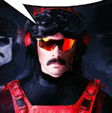 a man with a mustache wearing sunglasses and headphones has a speech bubble above his head