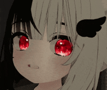 a close up of a girl with red eyes and angel wings