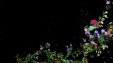 a bunch of yellow flowers are falling from the sky