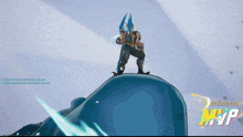 a man standing on top of a blue whale with the words mvp on the bottom