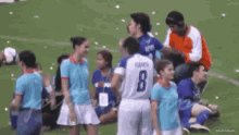a soccer player with the number 8 on the back of his shirt