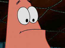 a close up of patrick star 's face with a surprised expression