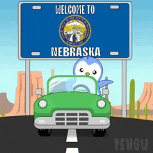 a welcome to nebraska sign with a penguin in a green car