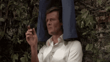 Roger Moore The Man With The Golden Gun GIF - Roger Moore The Man With The Golden Gun James Bond GIFs