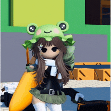a girl wearing a frog hat and scarf is holding a banana