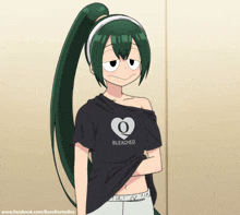 a girl wearing a black shirt that says bleached on it