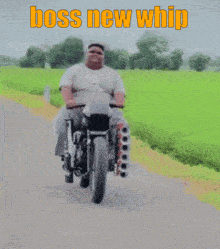 a man is riding a motorcycle with the words boss new whip written above him