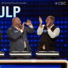 High Five Family Feud Canada GIF - High Five Family Feud Canada We Did It GIFs