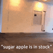 a sign that says sugar apple is in stock on it