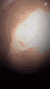 a pixel art of a woman 's face with the letter m in the corner