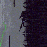 a computer screen shows a green line going through a dark room