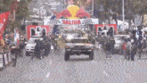 a bmw is driving down a street in front of a salida sign