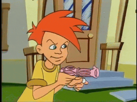 Junior tries shooting the pink gun and the pellet falls to the floor