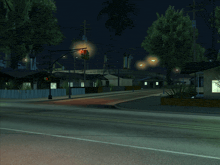 a computer generated image of a street at night with a red light on