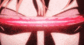 a close up of a person 's face with a red light coming out of their mouth