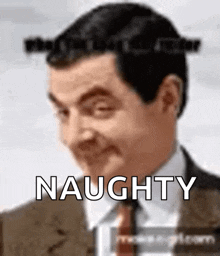 a man in a suit and tie is making a funny face and the word naughty is visible behind him .