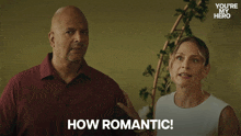 a man and a woman standing next to each other with the woman saying how romantic