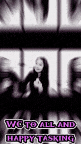 a blurry picture of a woman with the words " wc to all and happy tasking " on the bottom