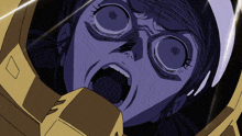 a close up of a person 's face with a yellow helmet on