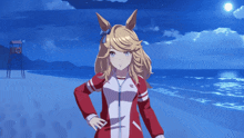 a girl with blonde hair is standing on a beach in front of the ocean