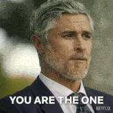 a man in a suit and tie says you are the one on netflix