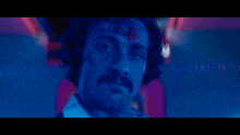 a man with a mustache says " and lemon never bleeds " in yellow letters