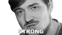 a black and white photo of a man with a beard and the words strong above him