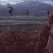 a giant monkey is flying through the air in a forest .