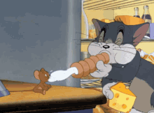 Tom And Jerry Cream Roll GIF - Tom And Jerry Cream Roll Blow GIFs