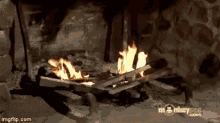 Fire Stoking GIF - Fire Stoking Fueling GIFs