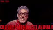 a man with glasses and a beard has the words che combatta questi animali written below him