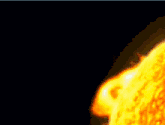 a close up of a person 's face with a flame coming out of it