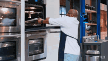 Putting The Dish Into The Oven Ed Porter GIF - Putting The Dish Into The Oven Ed Porter Pressure Cooker GIFs