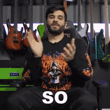 a man wearing a sweater that says so on it