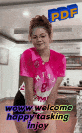 a woman in a pink shirt with the number 8 on it is standing in front of a sign that says pdf