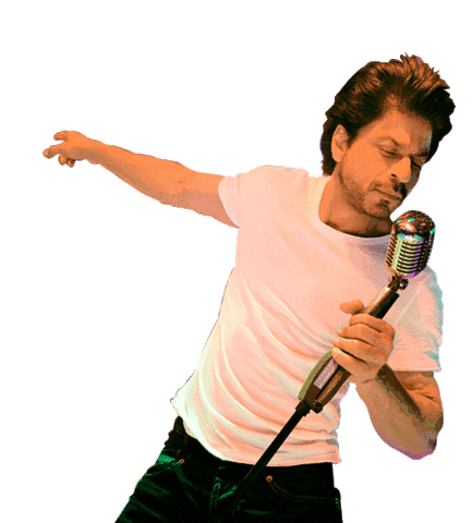 Shah Rukh Khan strikes his signature pose as he greets fans outside Mannat